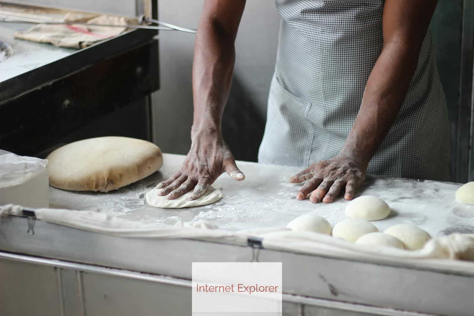 Man Preparing Dough For Bread